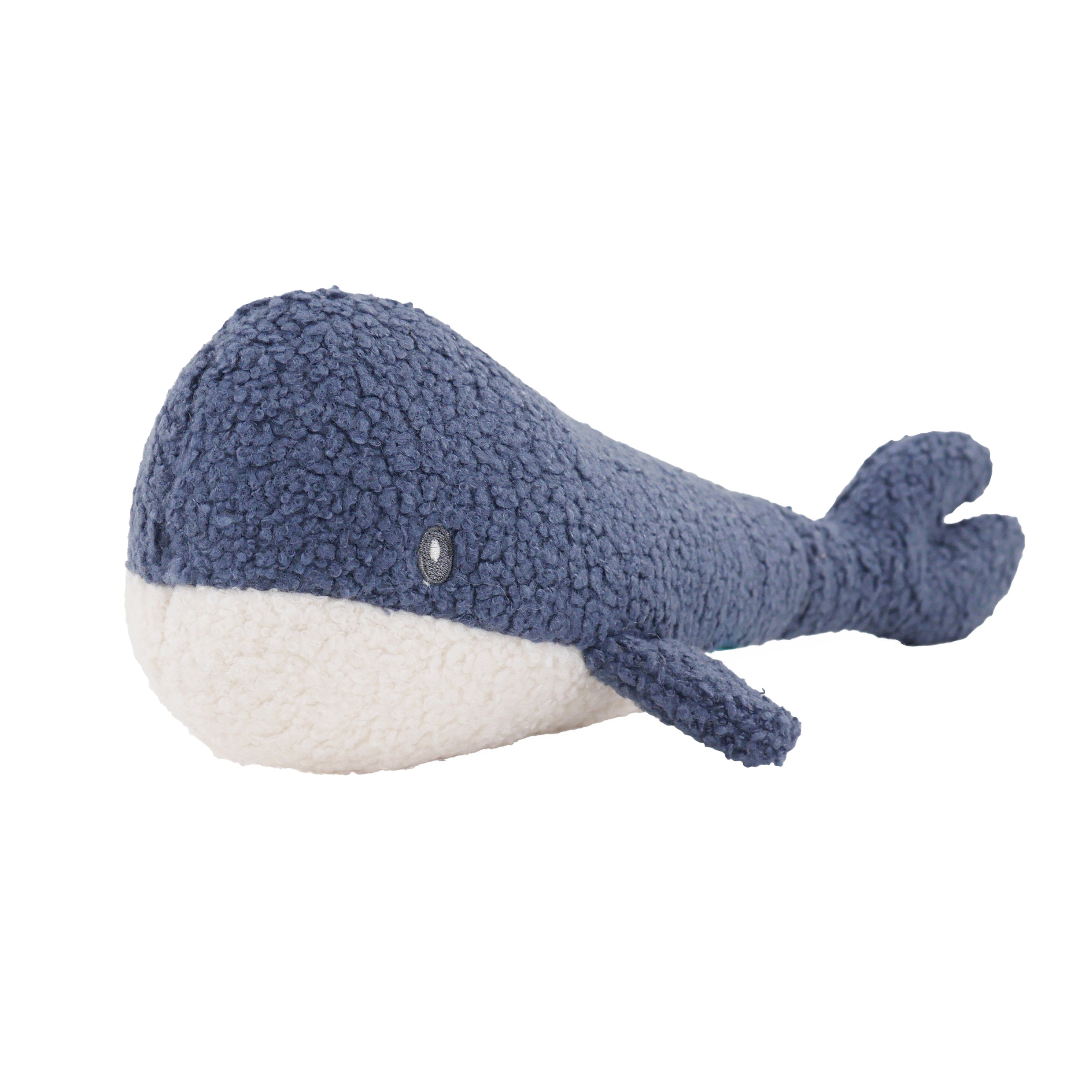 Blue plush whale toy on a white background